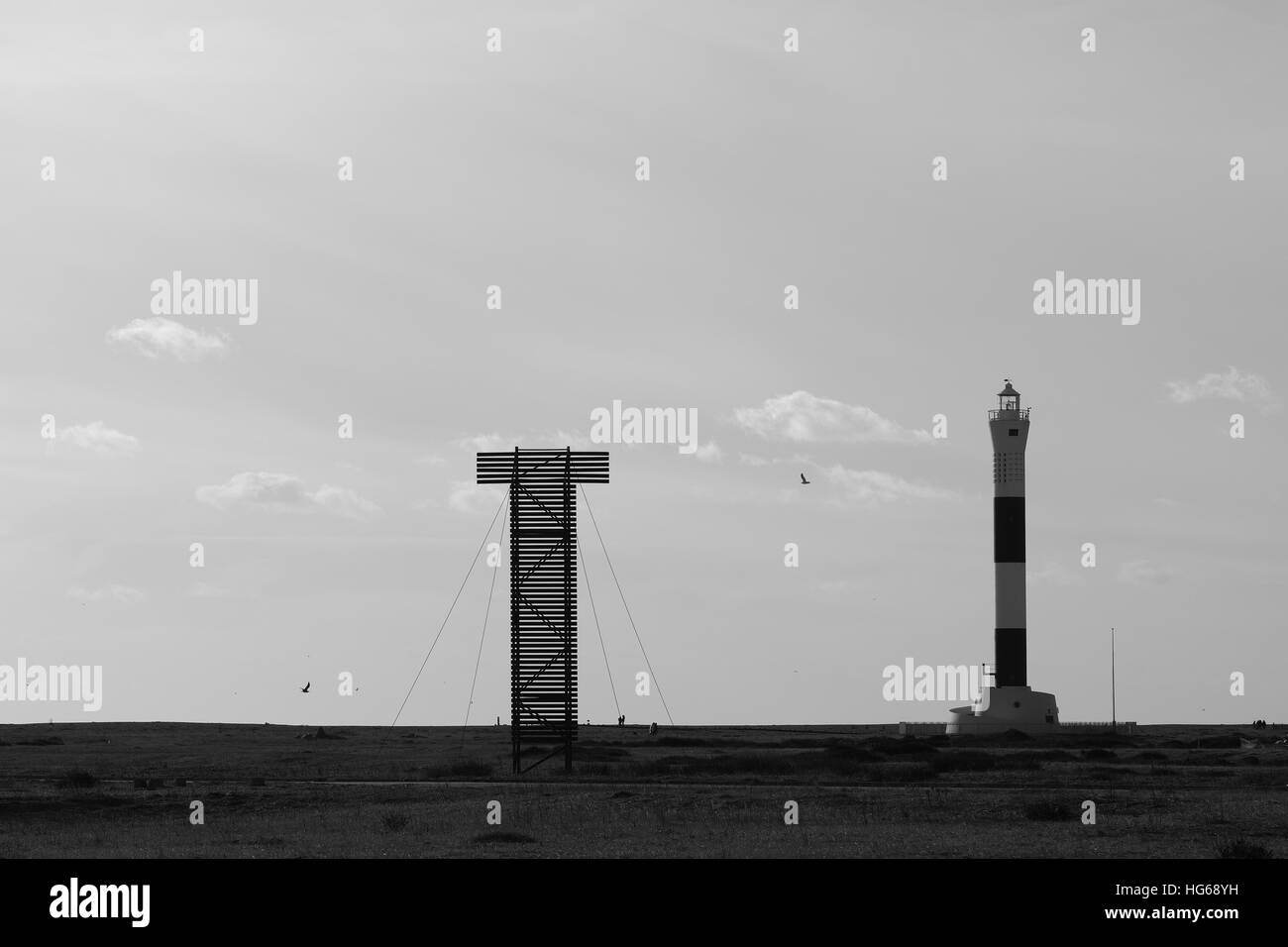 Structure en bois et le phare de Dungeness Banque D'Images