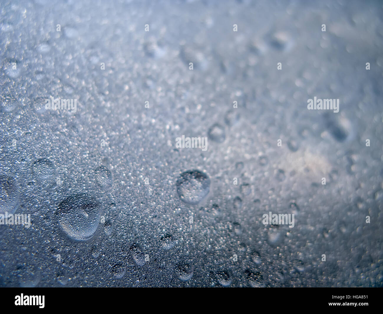 La texture de fond de gouttes d'eau et les gouttelettes sur une surface en verre avec couvercle Banque D'Images