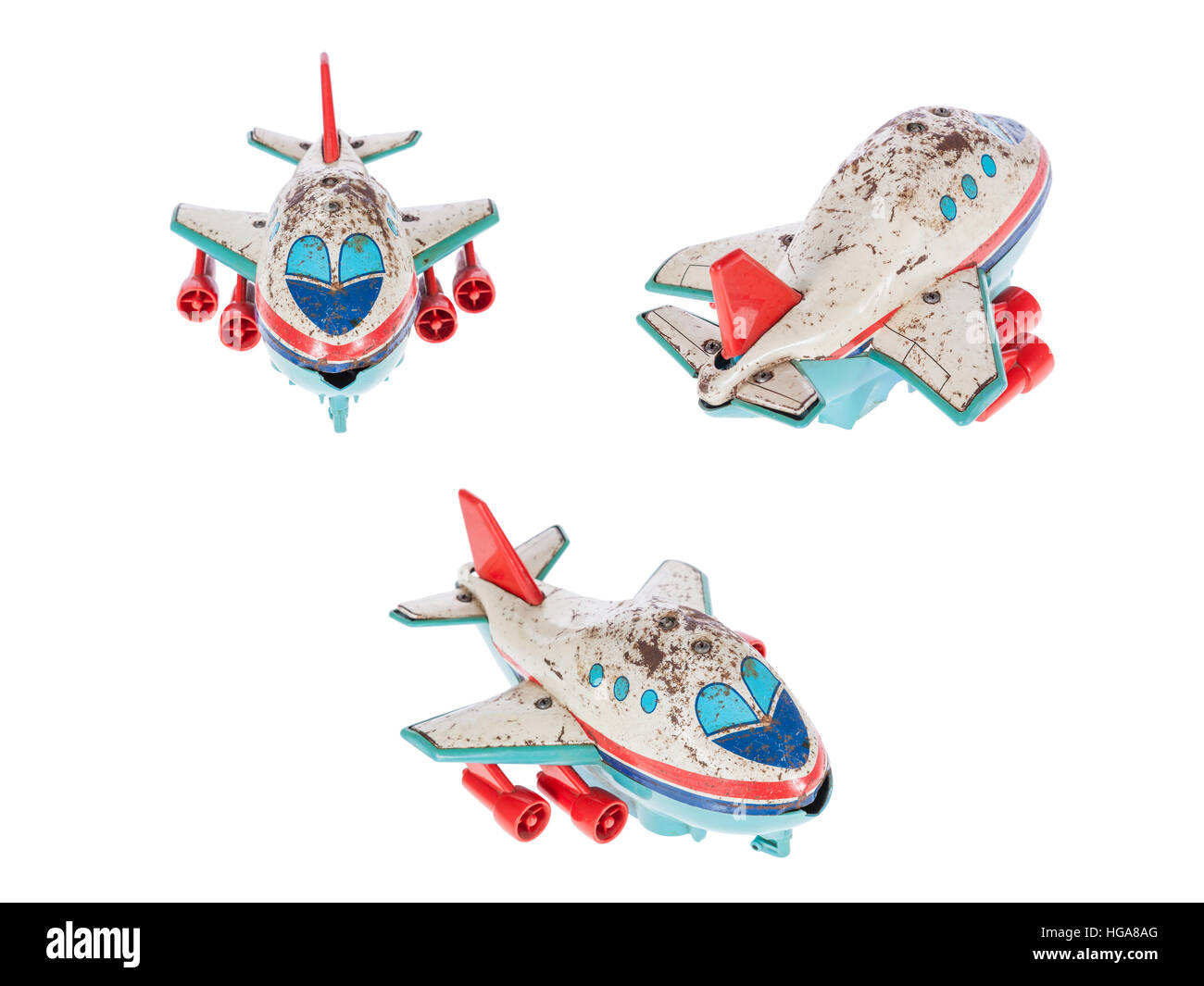 Old rusty tin toy. Avion isolé sur un fond blanc. Banque D'Images