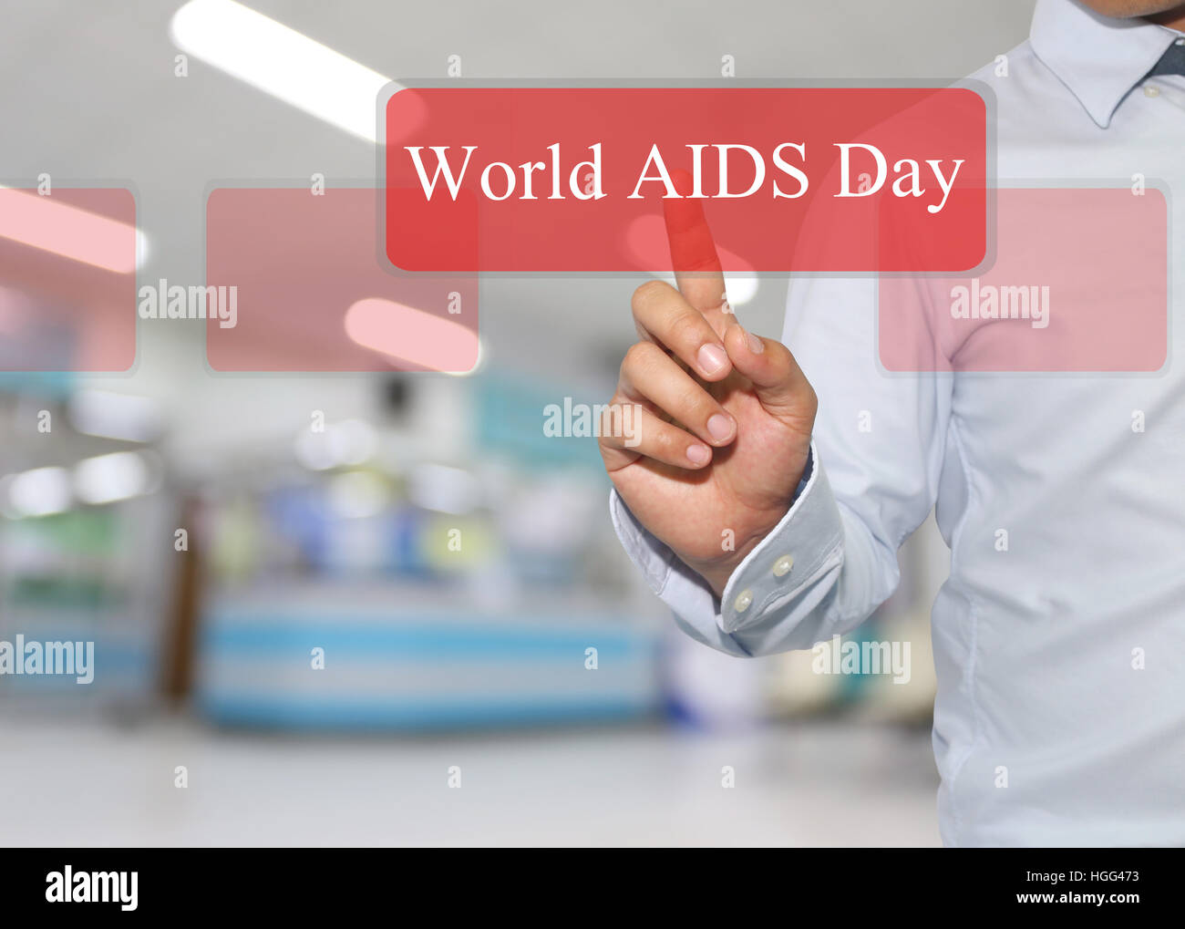 Main de businessman touch texte dans la journée mondiale de lutte contre le sida de l'hôpital sur fond flou,concept de relations publiques et de la campagne. Banque D'Images