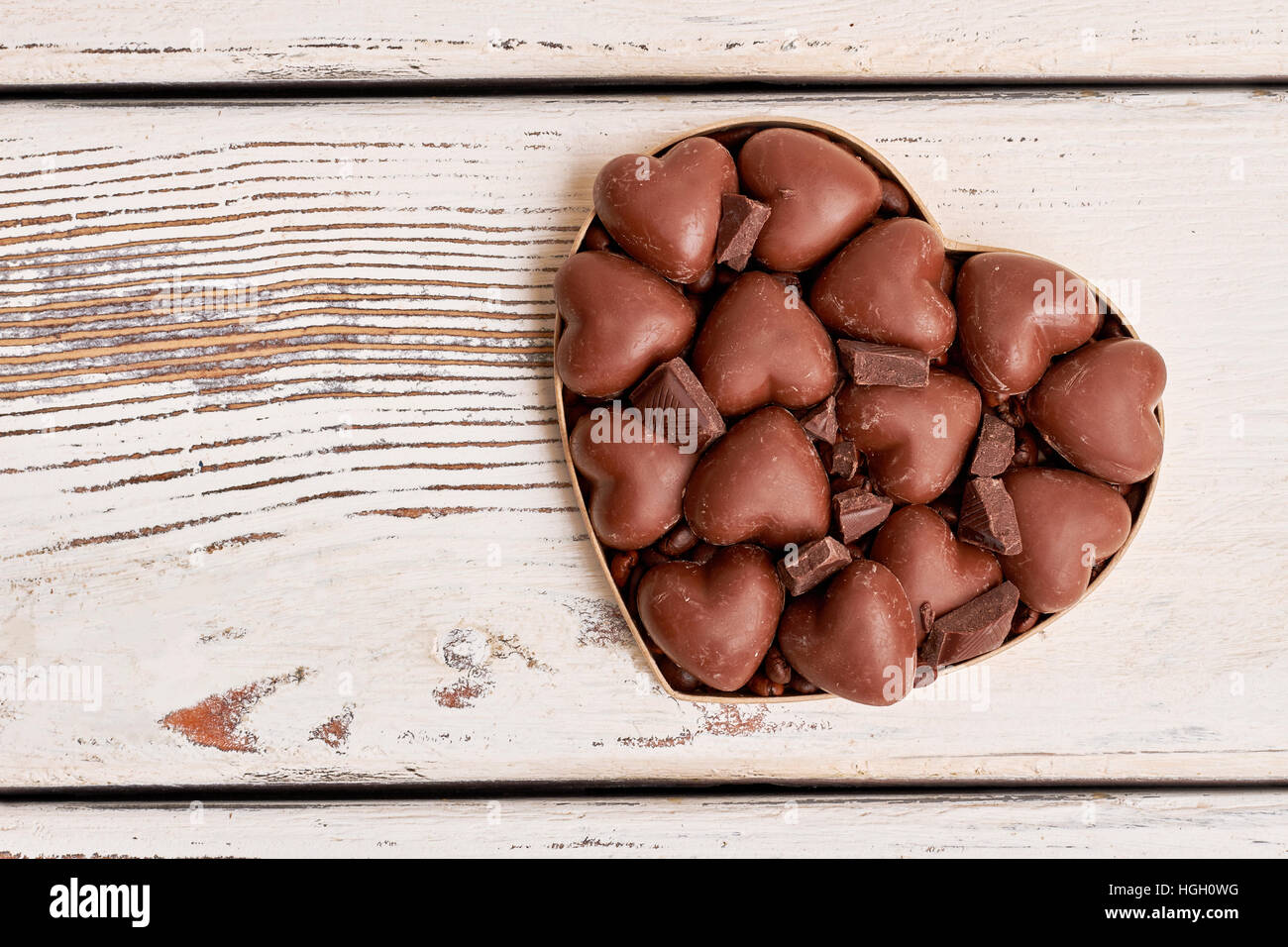 Heart-shaped box avec des chocolats. Banque D'Images