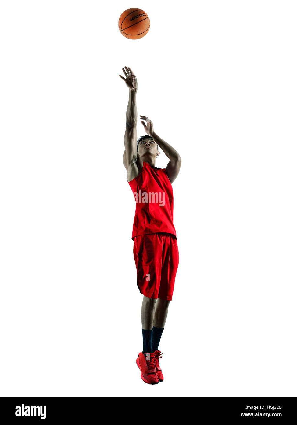 Un joueur de basket-ball homme asiatique en silhouette isolé sur fond blanc Banque D'Images