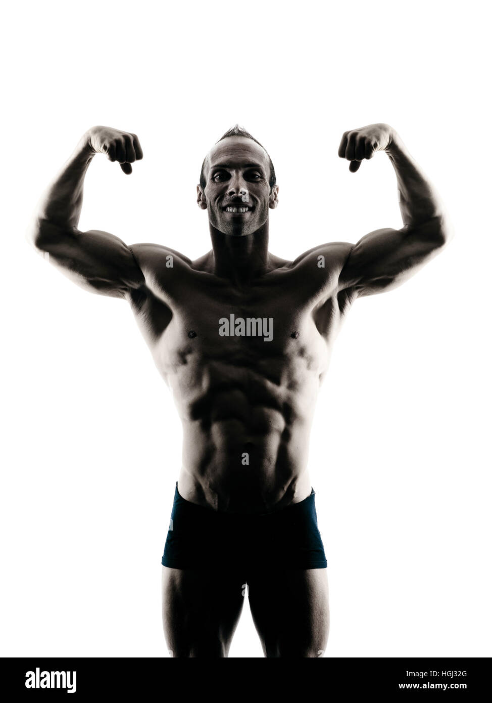 Un homme de race blanche l'exercice musculation fitness exercices en studio en silhouette isolated Banque D'Images
