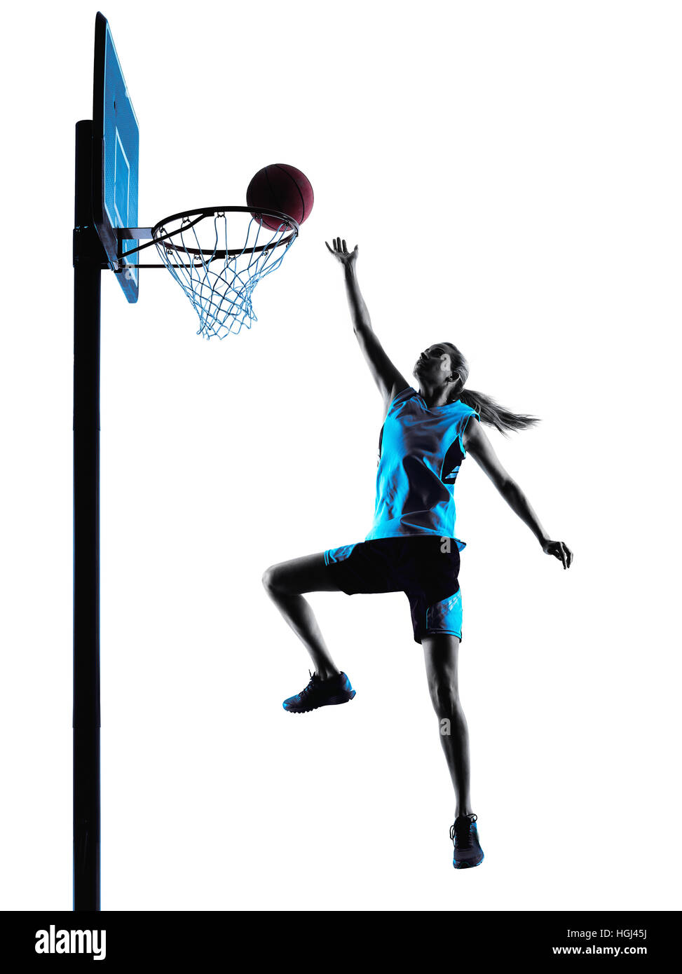 Un joueur de basket-ball femme de race blanche tombant à l'ossature isolé sur fond blanc Banque D'Images