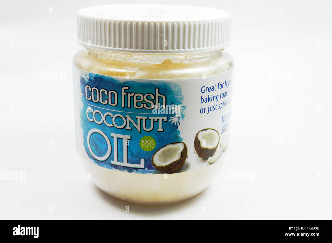 Pot de l'huile de noix de coco. Banque D'Images