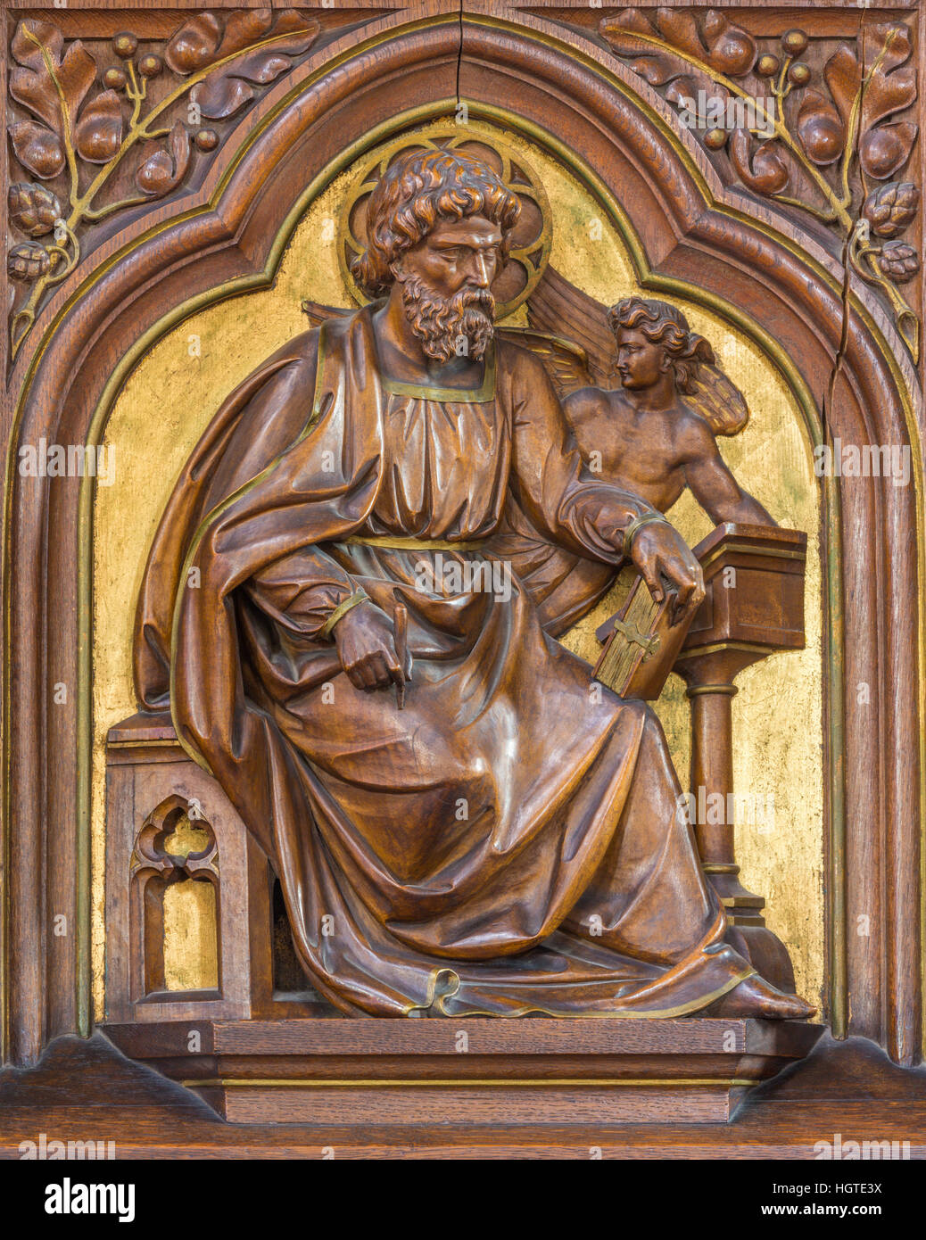 Vienne, Autriche - 19 décembre 2016 : Le relief sculpté de Saint Matthieu l'Évangéliste dans l'église Brigitta Kirche par artiste inconnu de 19 ans. 100. Banque D'Images