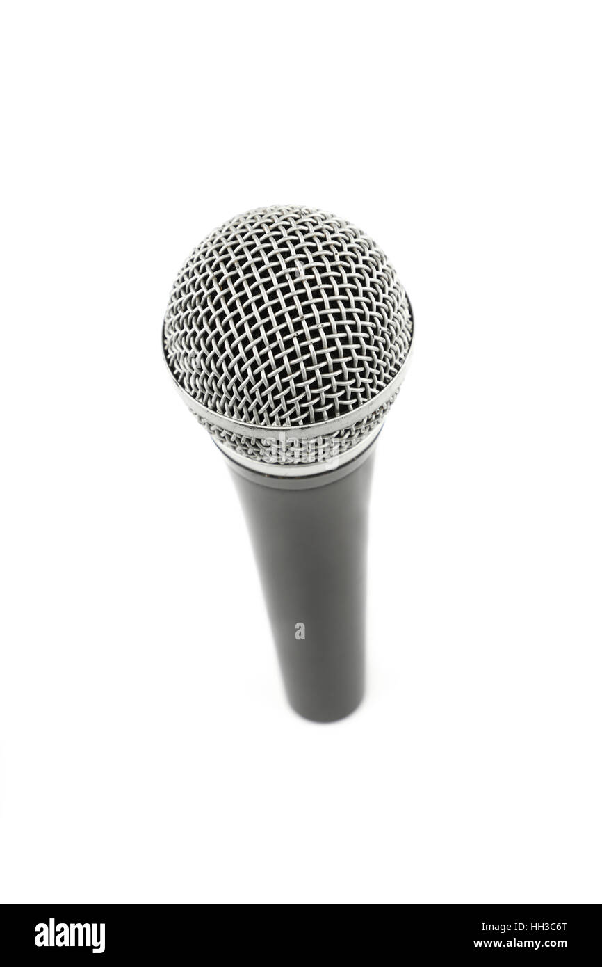 Microphone vocal high angle view close up isolé sur fond blanc, point de vue personnel Banque D'Images