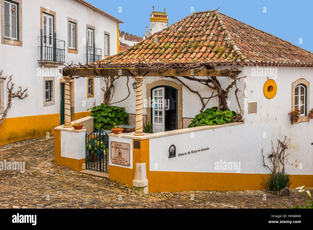 Les bâtiments dans la jolie ville médiévale d'Obidos Portugal Banque D'Images