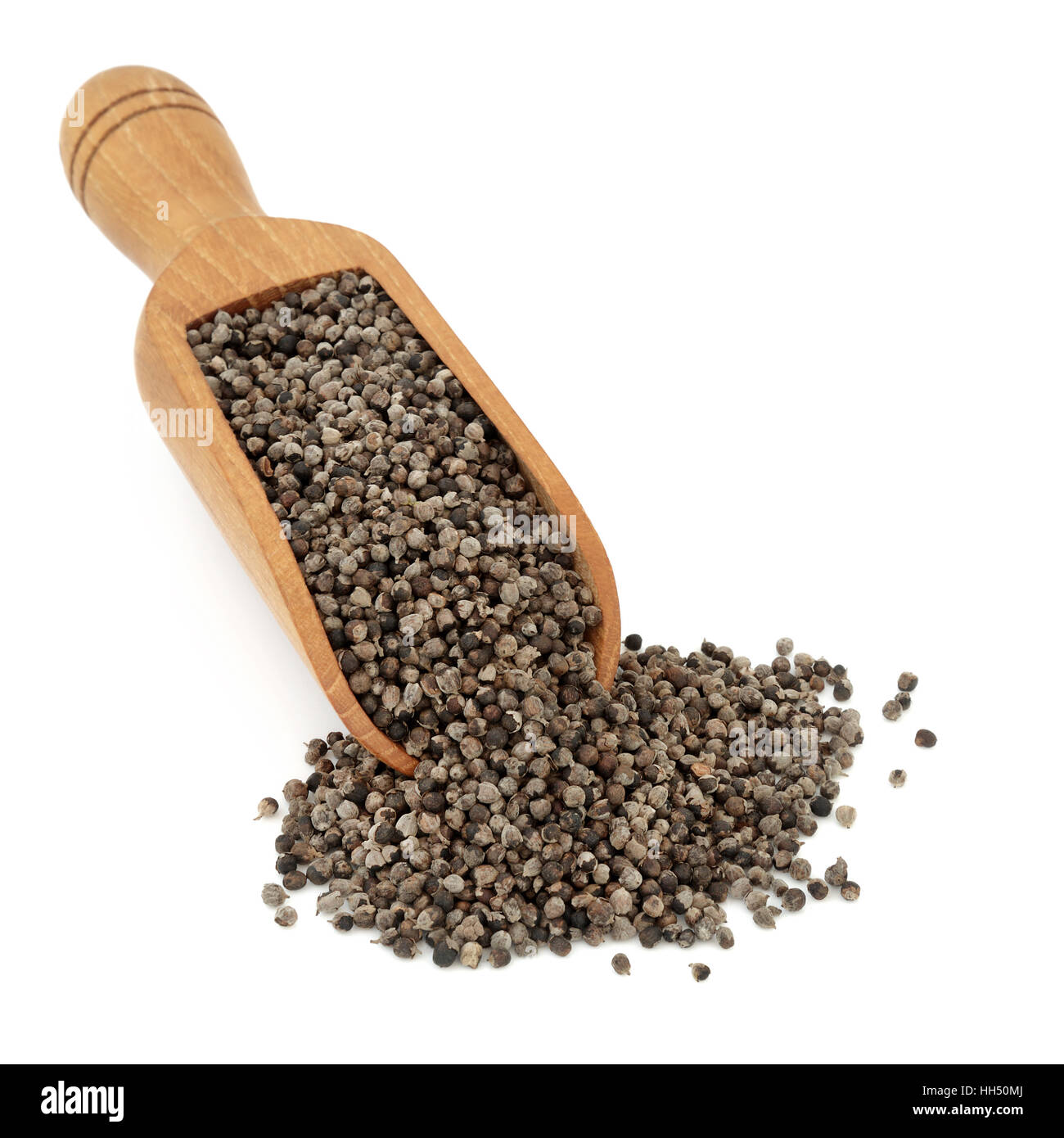 Vitex agnus castus phytothérapie dans un scoop en bois sur fond blanc. Utilisé en phytothérapie comme tonique pour le système reproducteur et la SLA peut Banque D'Images