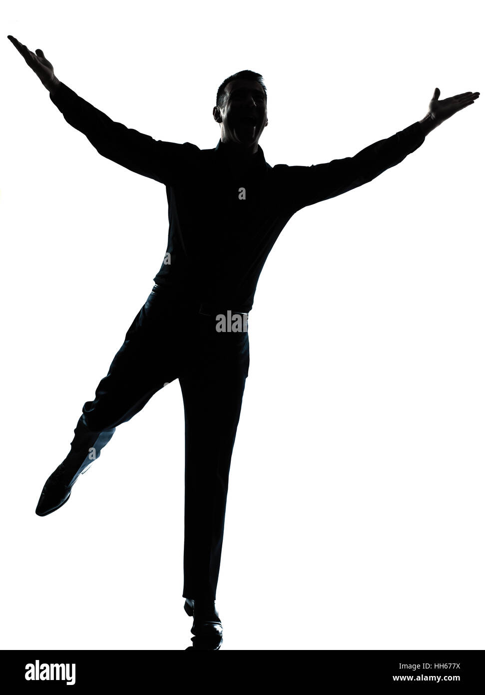 Un caucasian business homme heureux se propager dans toute la longueur des bras silhouette studio isolé sur fond blanc Banque D'Images