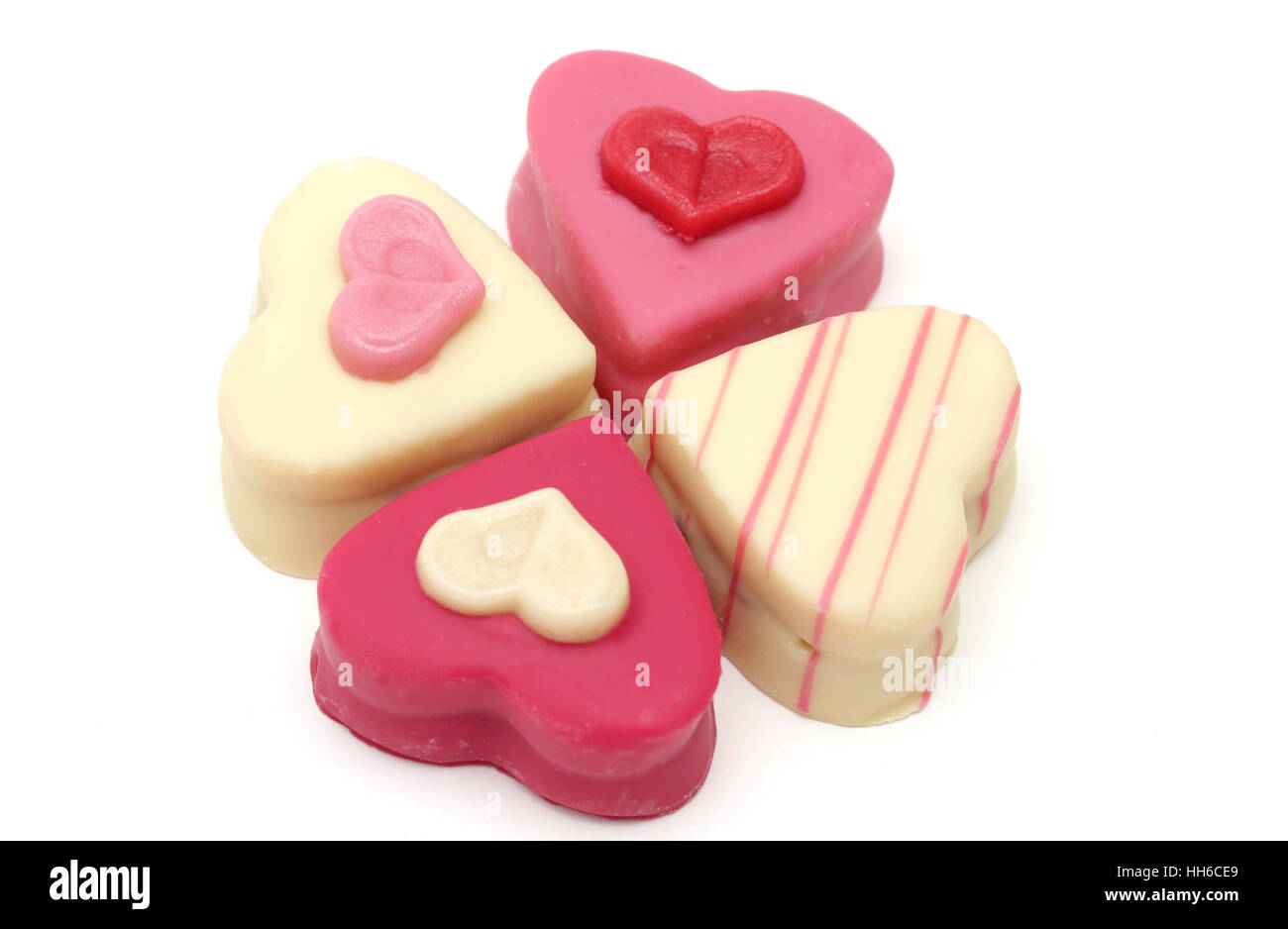 Quatre petits fours en forme de coeur pour la Saint-Valentin Banque D'Images
