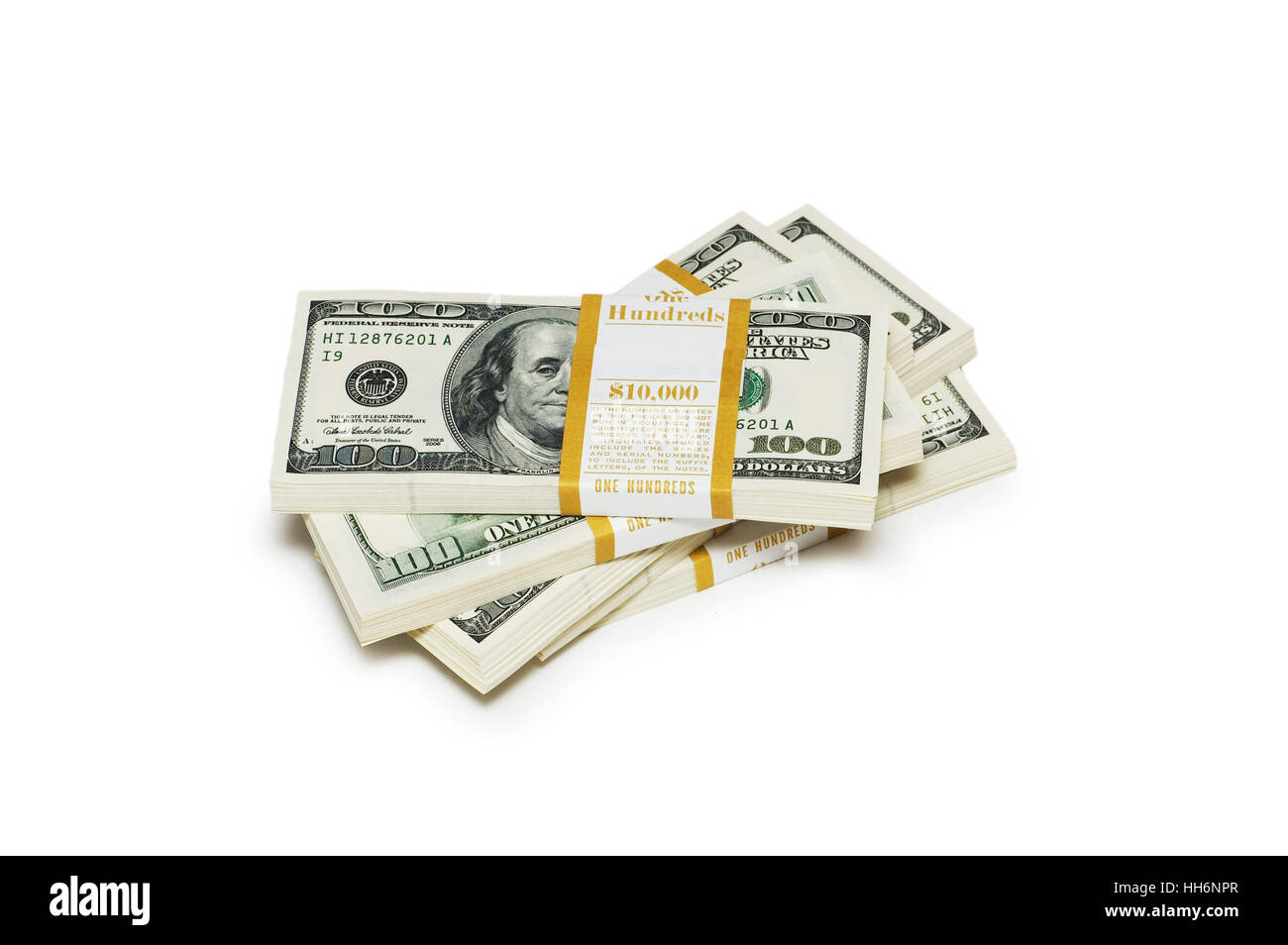 Dix mille dollars stacks sur le livre blanc Banque D'Images Dix mille dollars stacks sur le livre blanc Banque D'Images