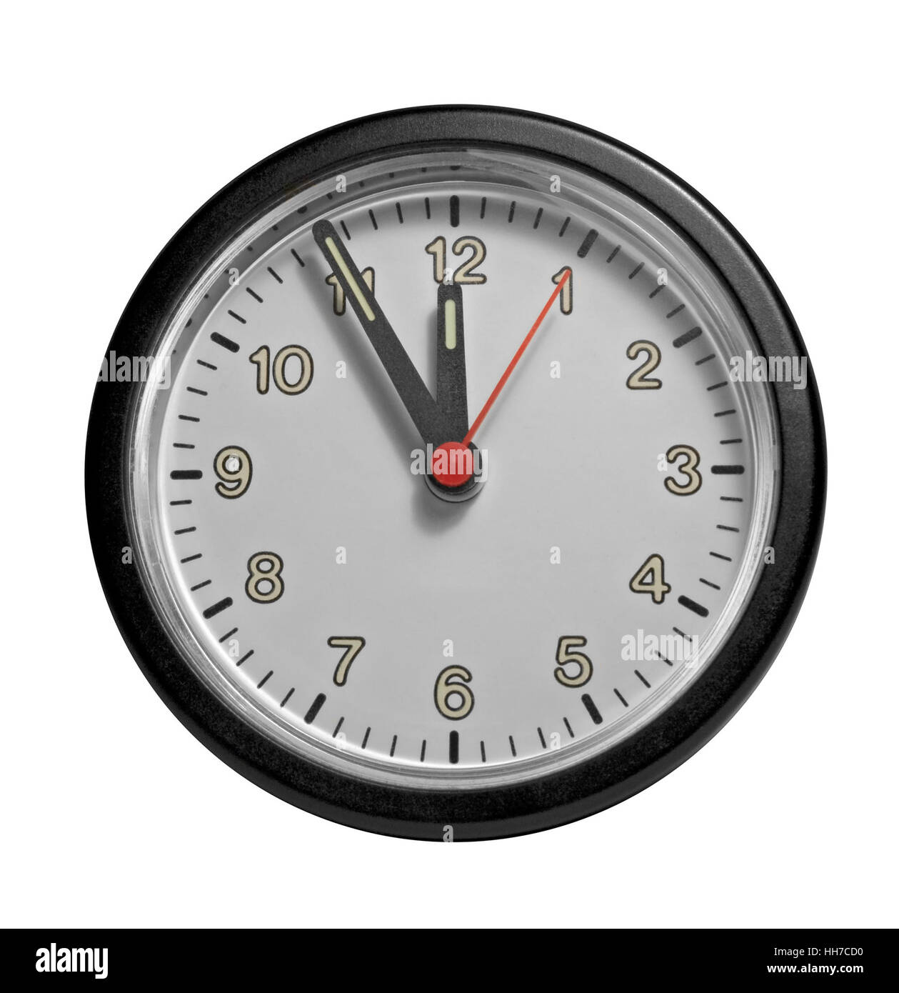 La photographie de studio d'une horloge indiquant cinq minutes à douze Banque D'Images