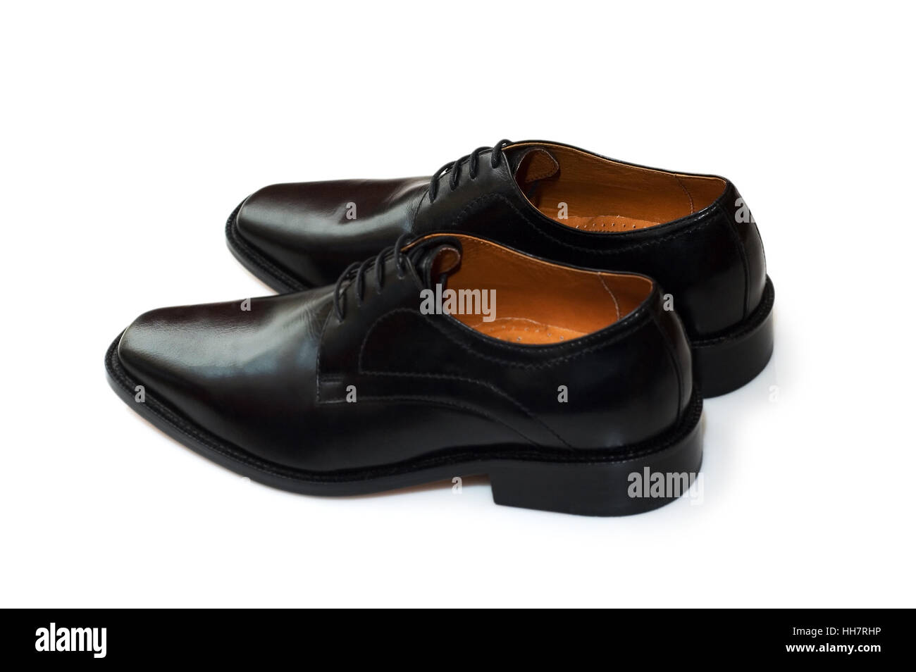 Chaussures homme noir isolé sur le livre blanc Banque D'Images