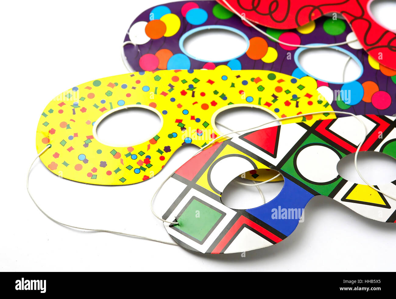 Masques Arlequin sur fond blanc Banque D'Images