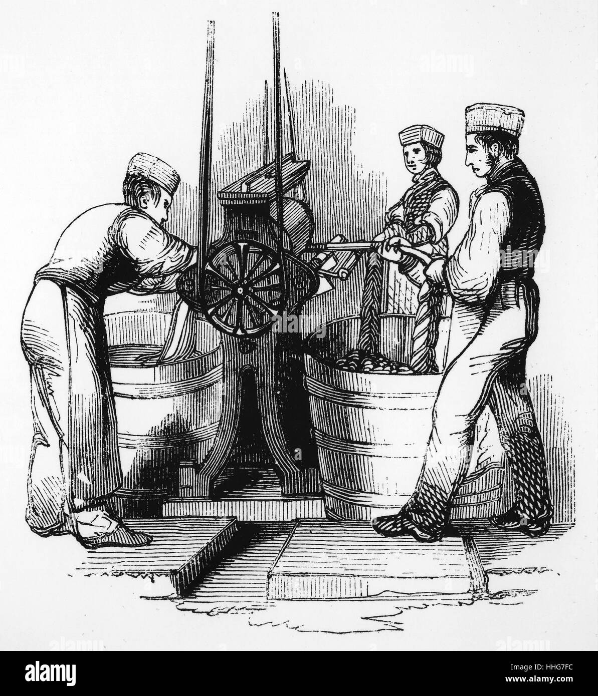 Illustration représentant la production de la laine à l'aide d'un affouillement-chaîne. En date du 19e siècle Banque D'Images
