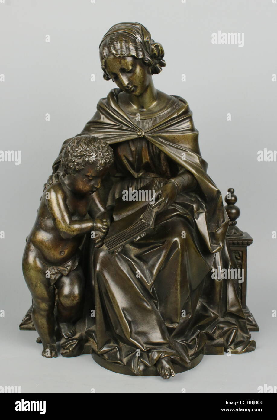 Meubles en bronze Mère et Enfant lisant Banque D'Images