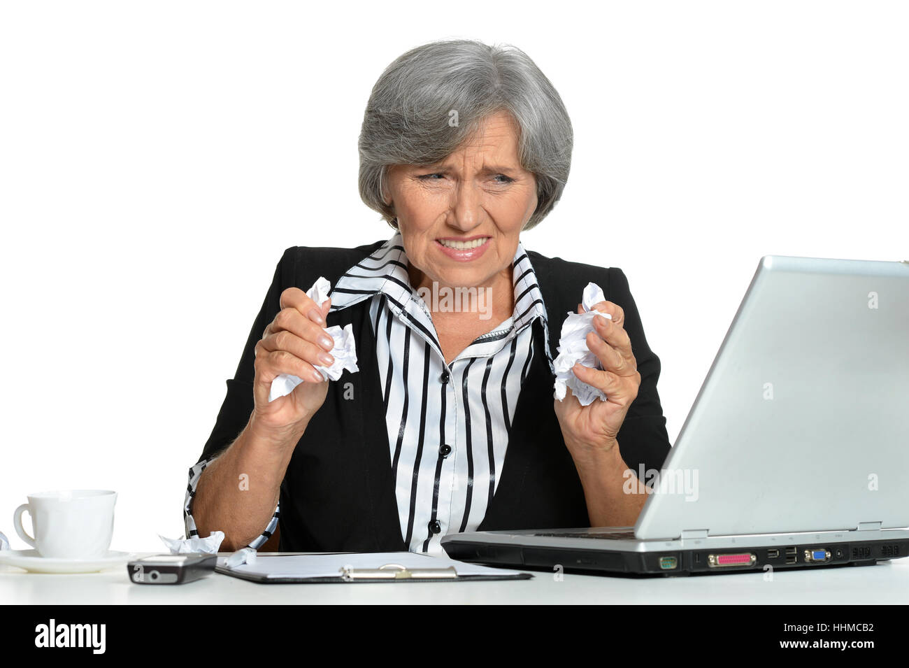 Portrait d'une femme mature en colère in office Banque D'Images