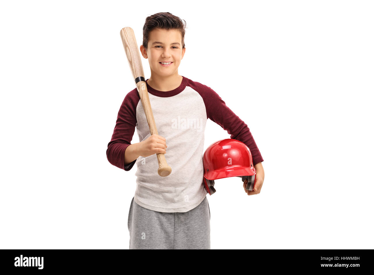 Heureux gamin avec un bâton de baseball et un casque isolé sur fond blanc Banque D'Images