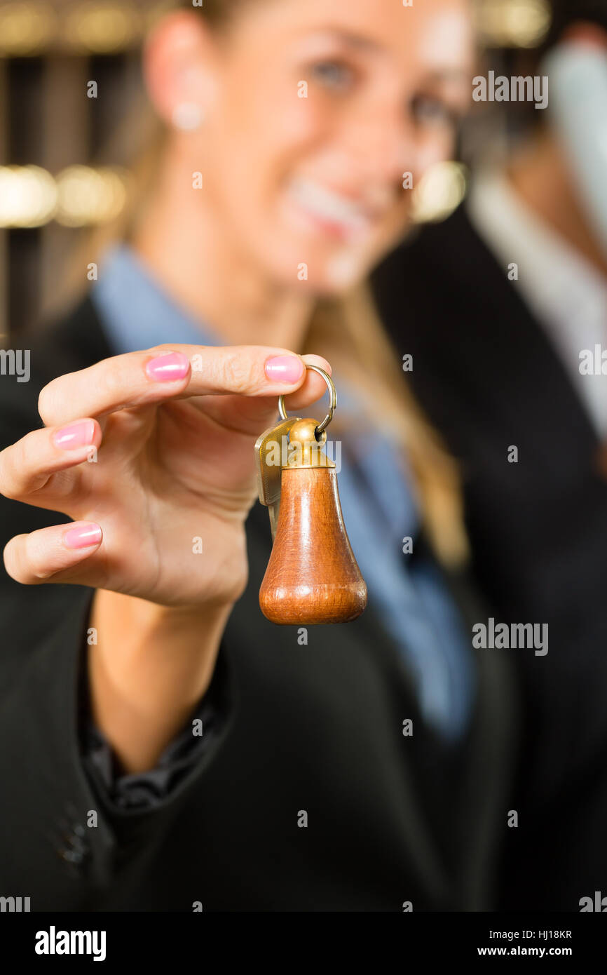 Femme, hôtel, pension, la réception, l'homme, auberge, taverne, pub, femme, téléphone, Banque D'Images