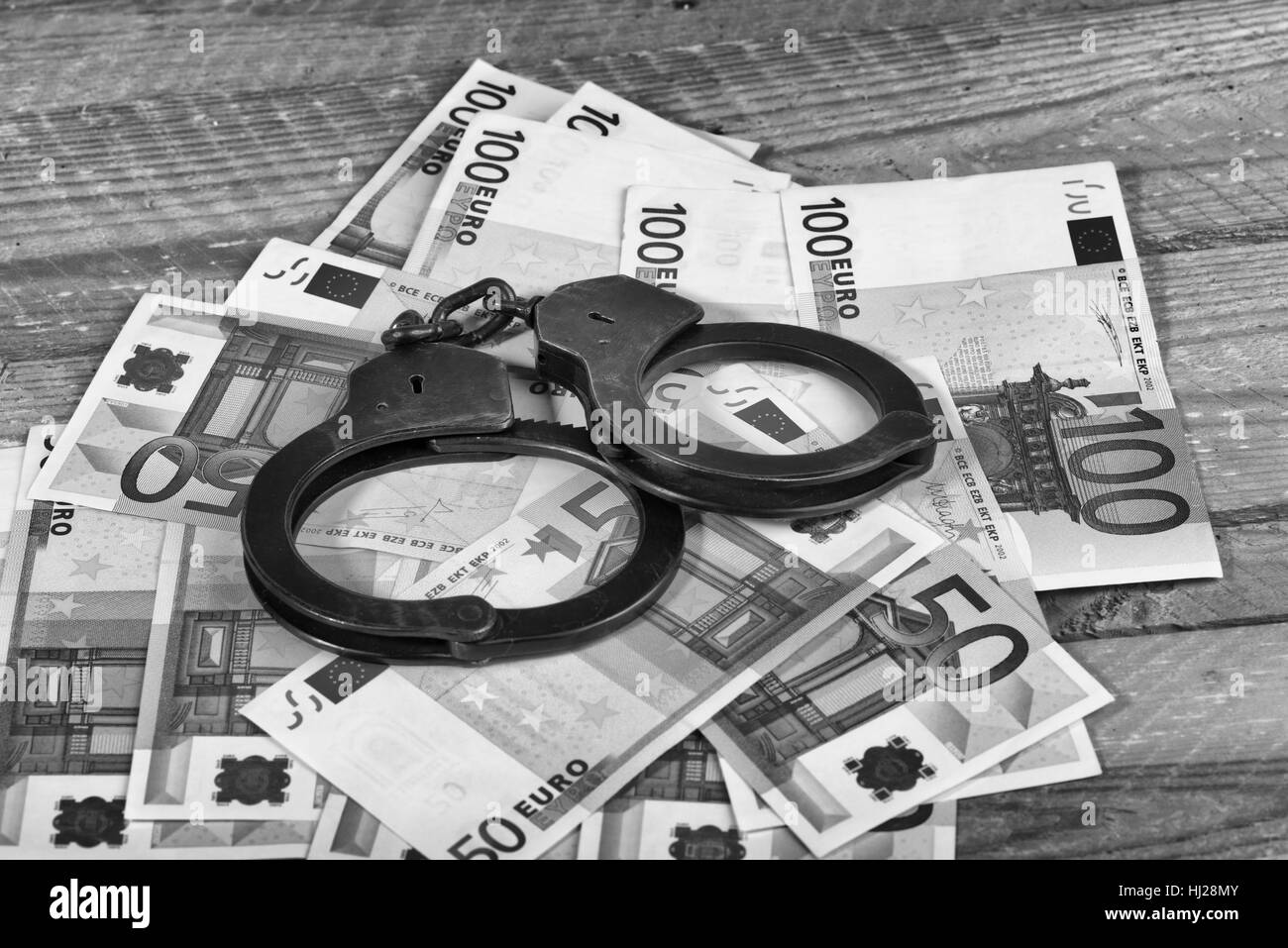 L'introduction des billets et des menottes Banque D'Images