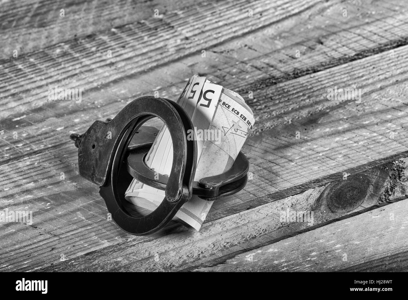 L'introduction des billets et des menottes Banque D'Images