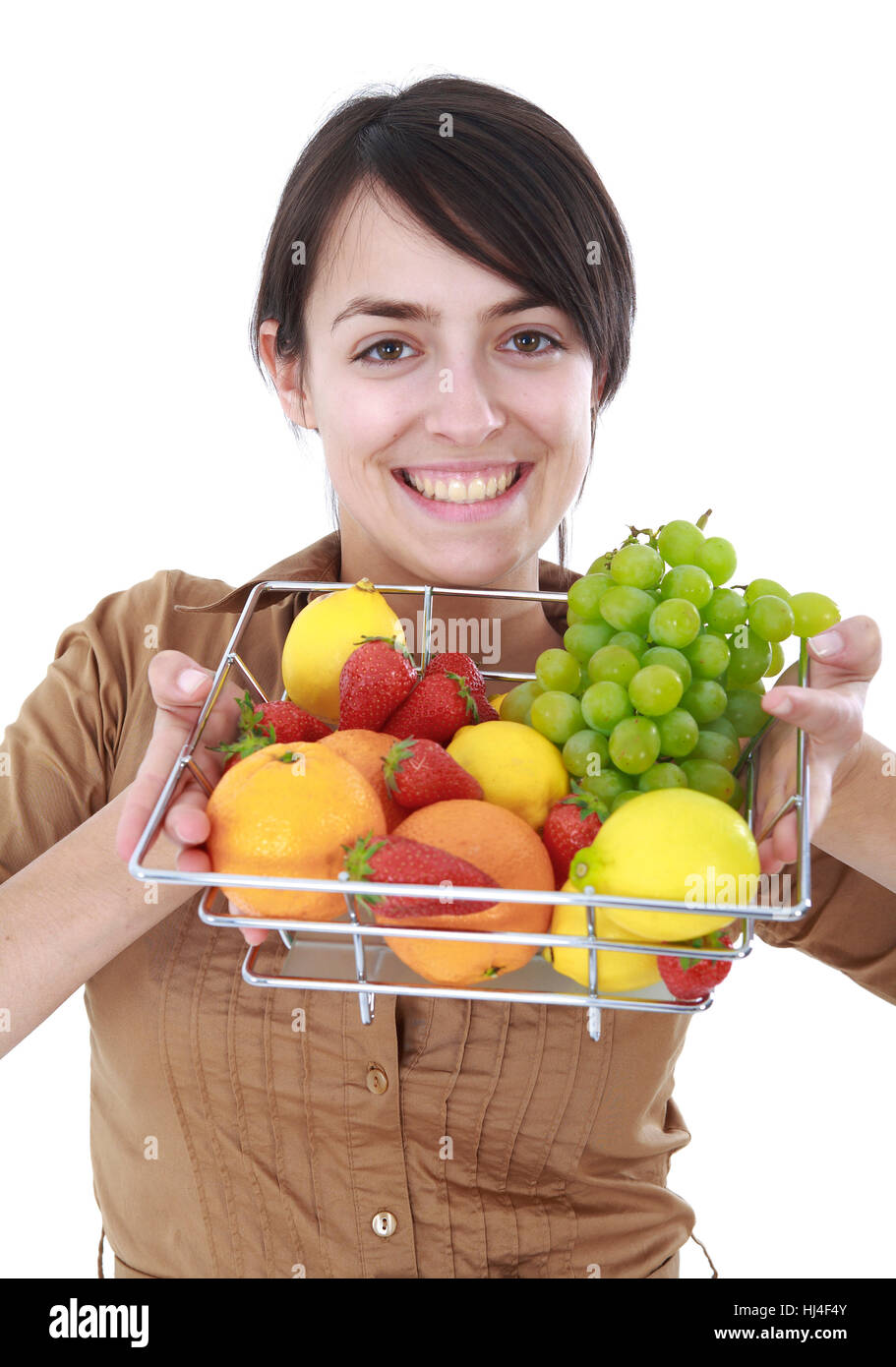 Jeune femme avec un fruit Banque D'Images