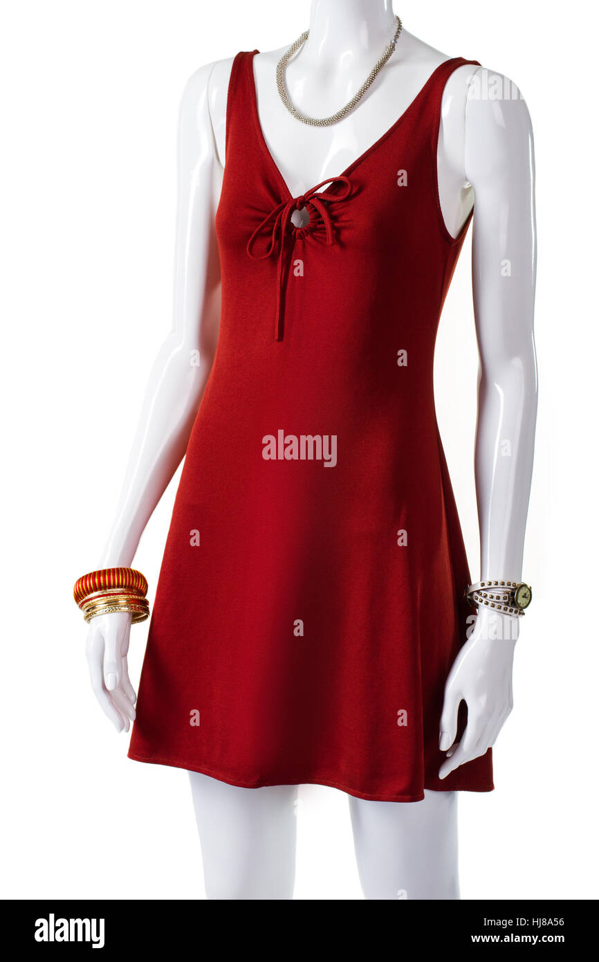 Robe rouge courte avec des accessoires. Banque D'Images