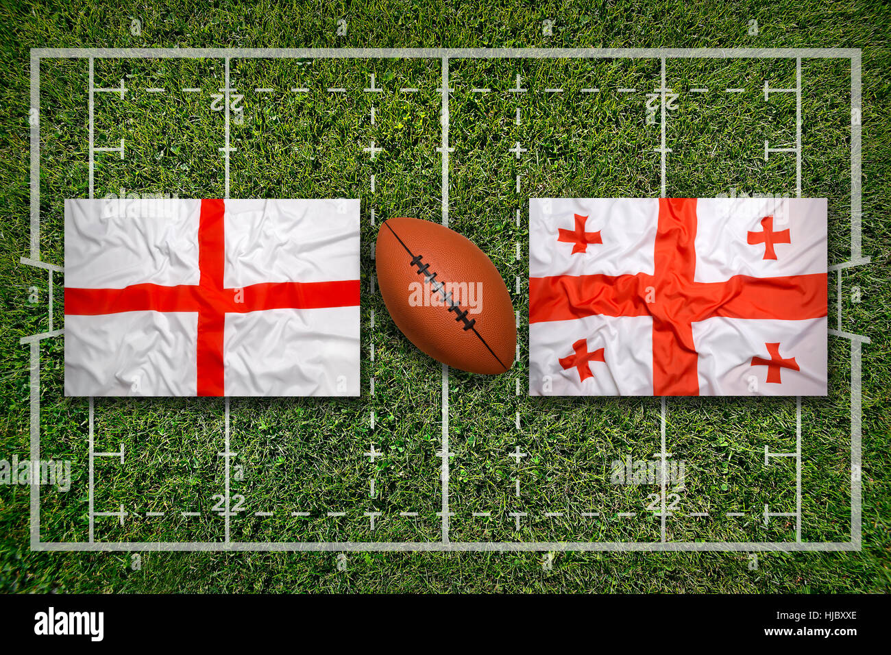 L'Angleterre contre la Géorgie Les drapeaux sur terrain de rugby vert Banque D'Images