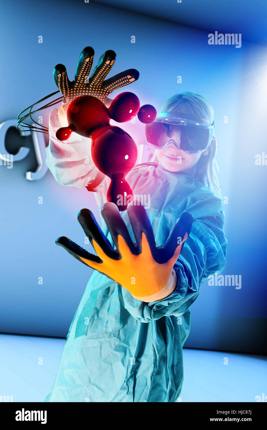 Fille de casque de réalité virtuelle interaction avec les globules de sang flottant numérique Banque D'Images