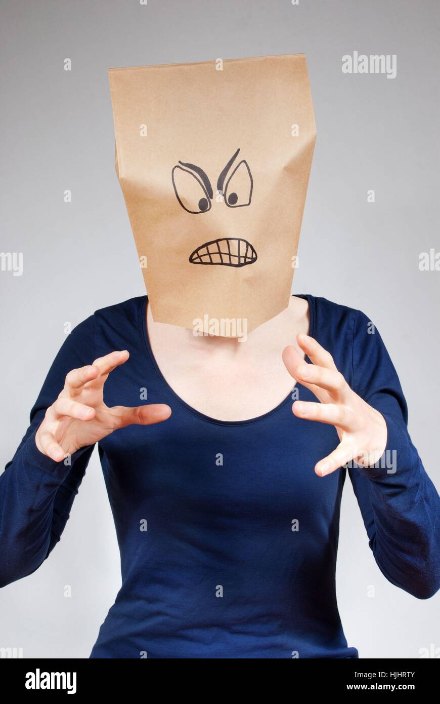 Une Colere A La Personne Qui Detient Ou S Attaquer A Quelque Chose Photo Stock Alamy