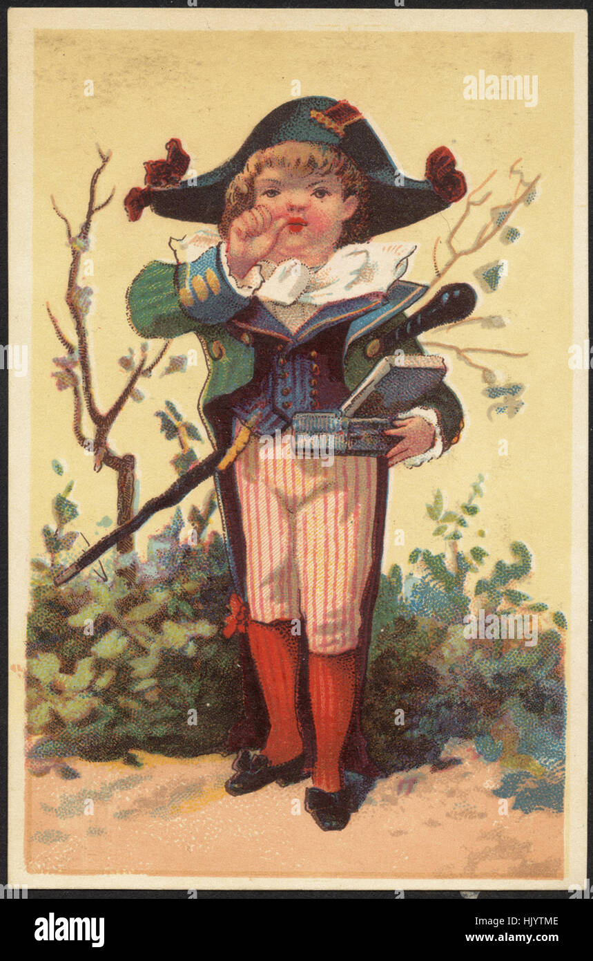 Garçon en costume historique tenant une boîte ouverte. Banque D'Images