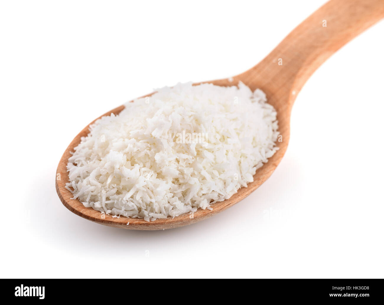 Cuillère en bois de copeaux de noix de coco isolated on white Banque D'Images