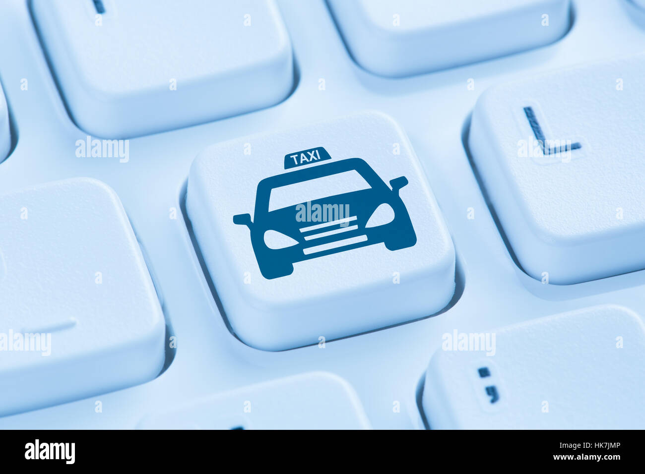 Réservez en ligne réservation internet taxi bleu symbole clavier de l'ordinateur Banque D'Images