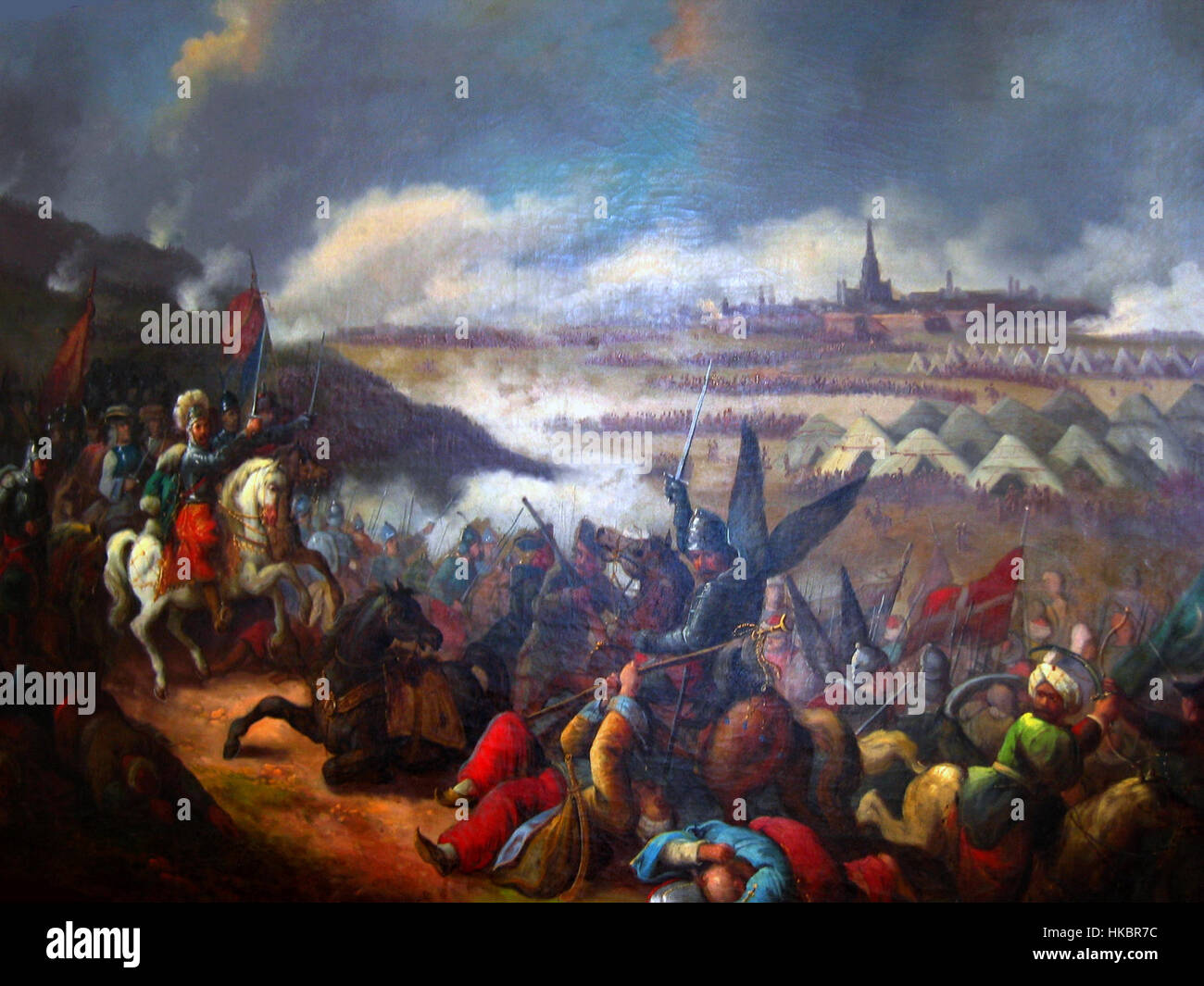 La bataille de Vienne en 1683 fut une confrontation décisive entre l'Empire ottoman et le Saint Empire romain germanique, avec la ville de Vienne comme champ de bataille central. La peinture capture l'intensité de la bataille et l'importance stratégique de la victoire pour l'histoire européenne. Banque D'Images