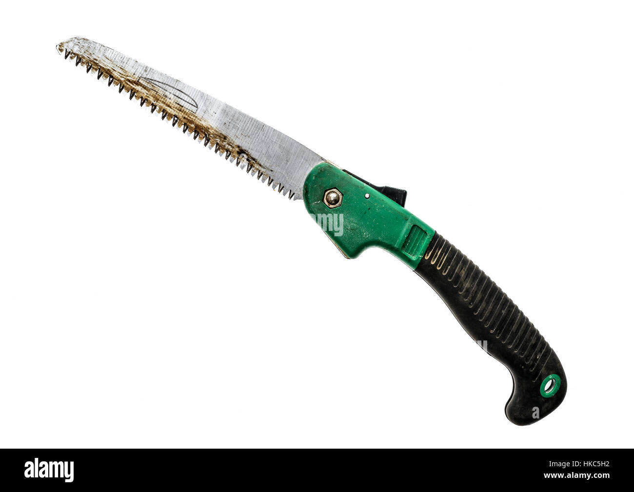 Poche de pliage vu isolé sur fond blanc. Dépliez l'a vu avec poignée verte Banque D'Images