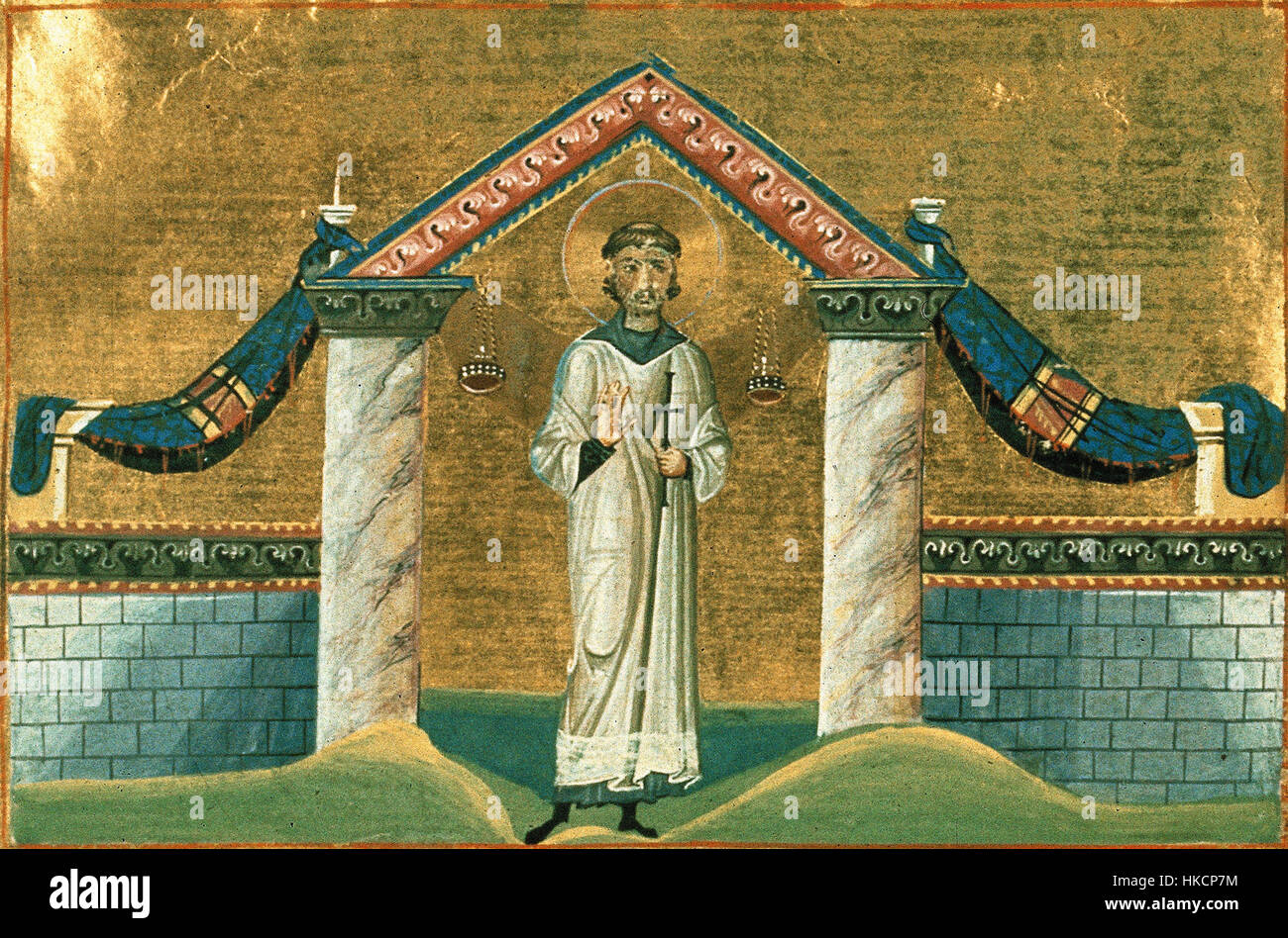 Cette illustration du « Ménologion de Basile II » représente Saint Vincent de Saragosse, un martyr chrétien et diacre. L'œuvre fait partie d'un manuscrit byzantin, présentant une iconographie détaillée et un symbolisme religieux, typiques de l'art byzantin du XIe siècle. Banque D'Images
