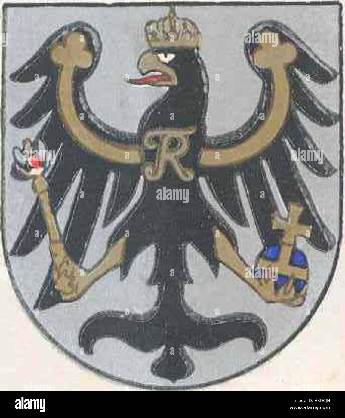 Cette pièce représente les armoiries de la Prusse orientale, mettant en valeur ses éléments symboliques. Les armoiries représentent l'identité historique de la région et son rôle dans l'histoire européenne. Banque D'Images