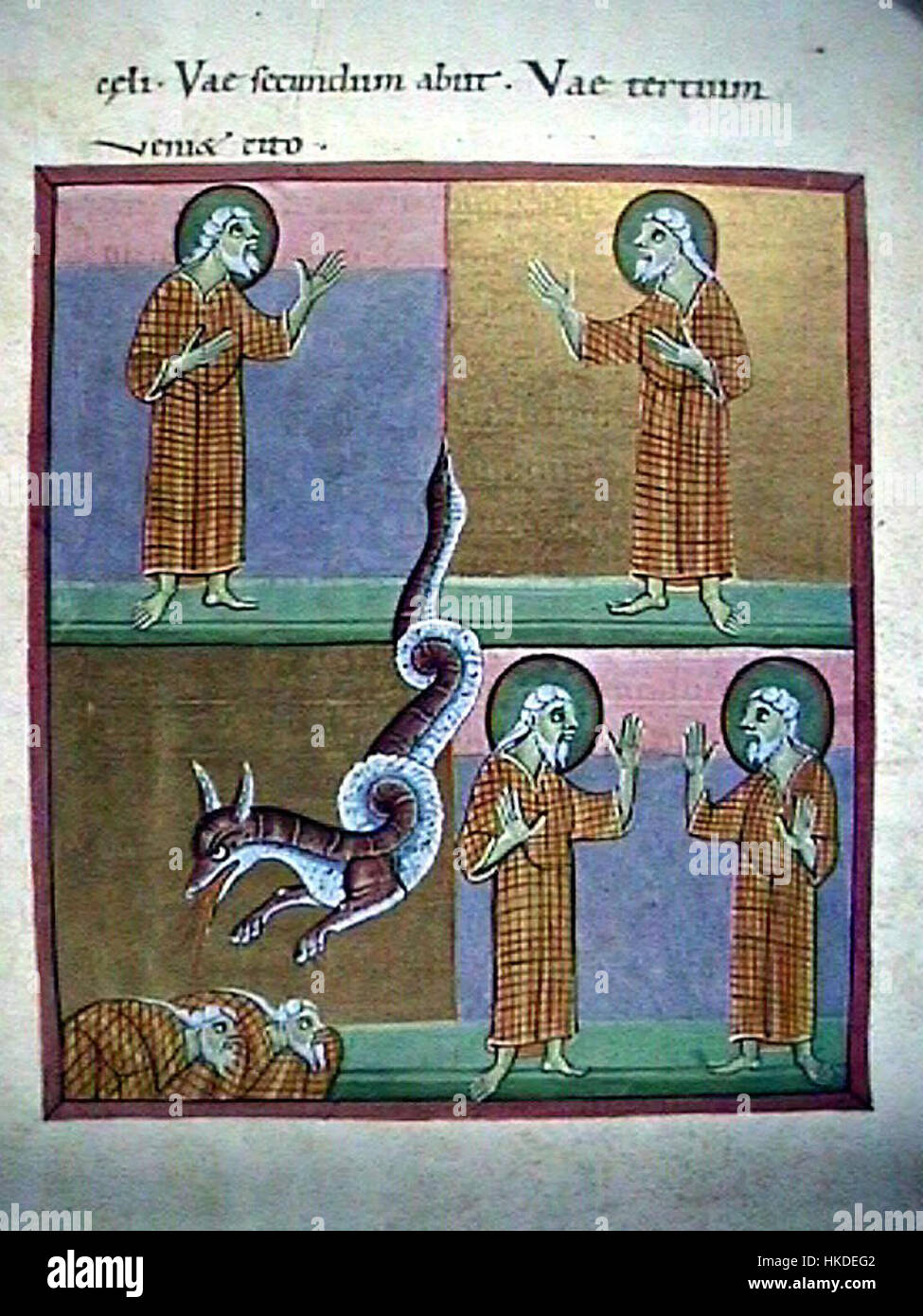 Le manuscrit de l'Apocalypse de Bamberg, daté du XIe siècle, est une œuvre enluminée représentant les visions de l'Apocalypse. Ce folio illustre les prophètes et la bête émergeant de l’abîme, scène clé de l’eschatologie chrétienne. Banque D'Images