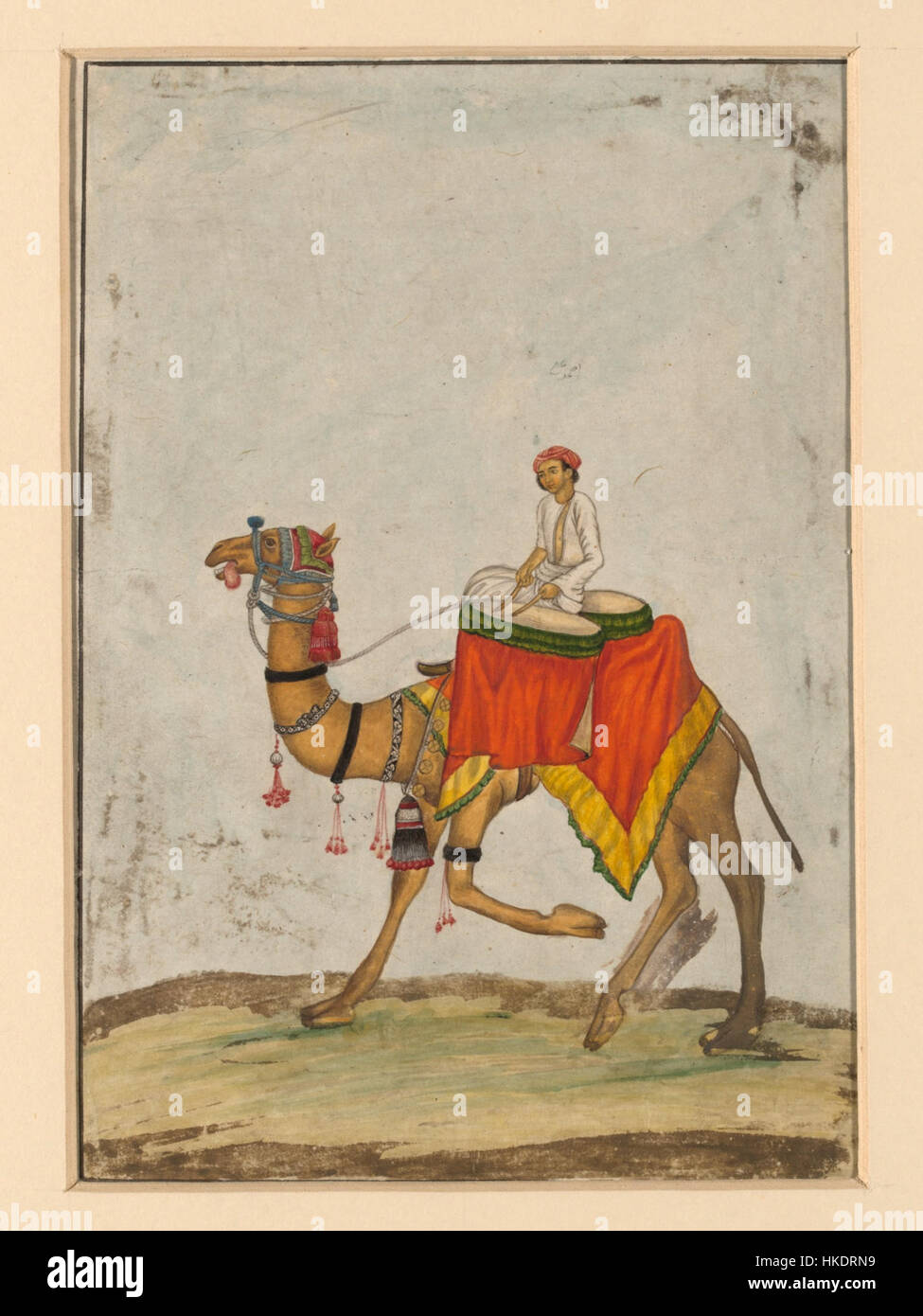 Cette œuvre représente un chameau avec son cavalier jouant des tambours de bouilloire, mettant en évidence une scène inhabituelle et culturellement significative. La peinture capture le rythme et le mouvement de la culture du désert, en mettant l'accent à la fois sur le chameau et les instruments de musique comme éléments centraux. Banque D'Images