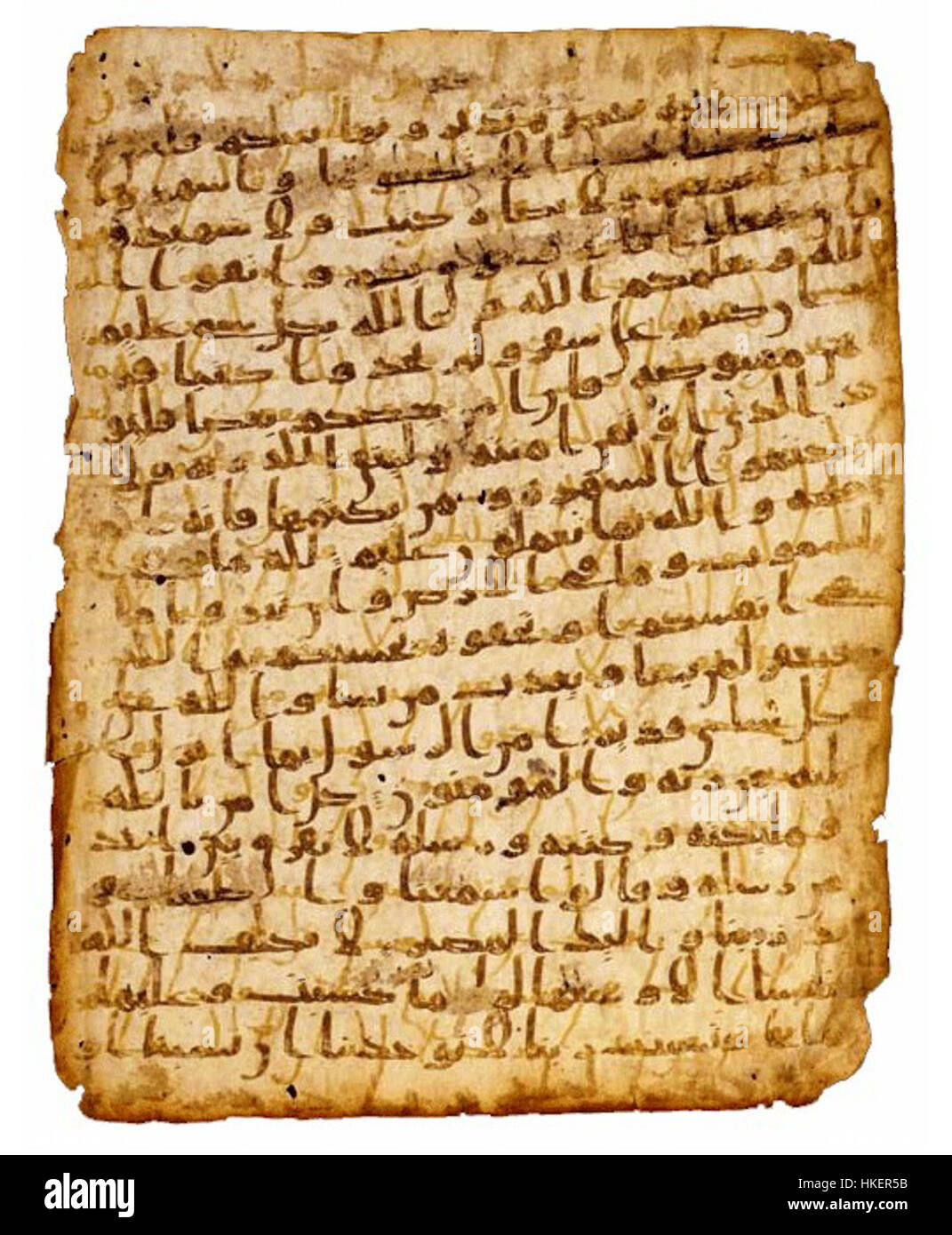 Ce manuscrit coranique met en valeur l'élégante écriture hijazi, l'un des premiers styles de calligraphie arabe. C'est un exemple significatif de l'art islamique, montrant l'artisanat minutieux impliqué dans la transcription des textes religieux au cours des premiers siècles de l'islam. Banque D'Images