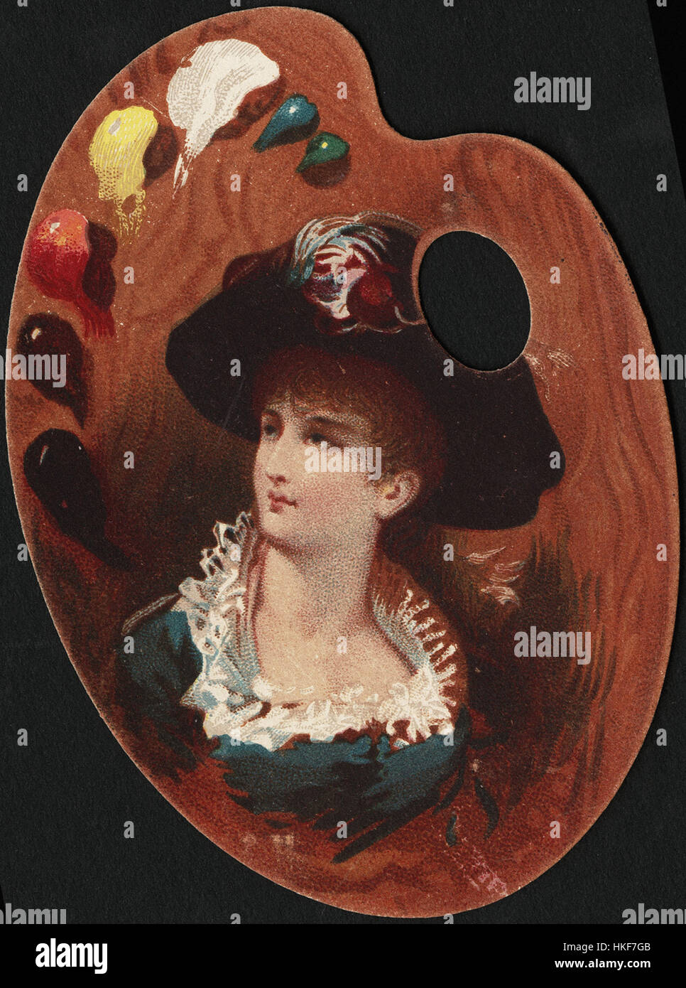 Femme avec un grand chapeau de poser. Banque D'Images