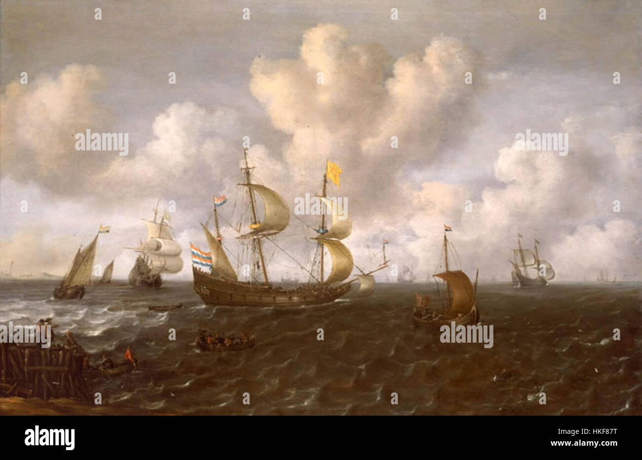 Joachim de Vries, Un navire hollandais avant le vent, capture la puissance et le mouvement d'un navire hollandais du XVIIe siècle naviguant en eaux libres. La peinture se concentre sur les voiles dynamiques du navire et le rôle du vent dans sa propulsion vers l'avant, symbolisant la domination maritime néerlandaise pendant l'âge d'or. Banque D'Images