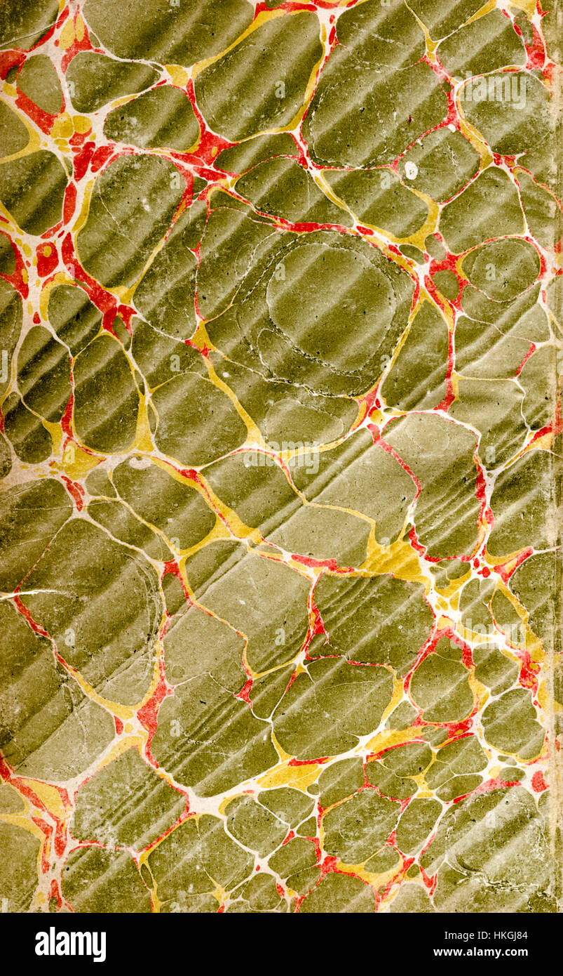 Pâte marbrée à la main ou papier de fin de reliure du XVIIIe siècle mettant en vedette la technique du moiré espagnol (motif turc avec motif à effet ondulé). Banque D'Images
