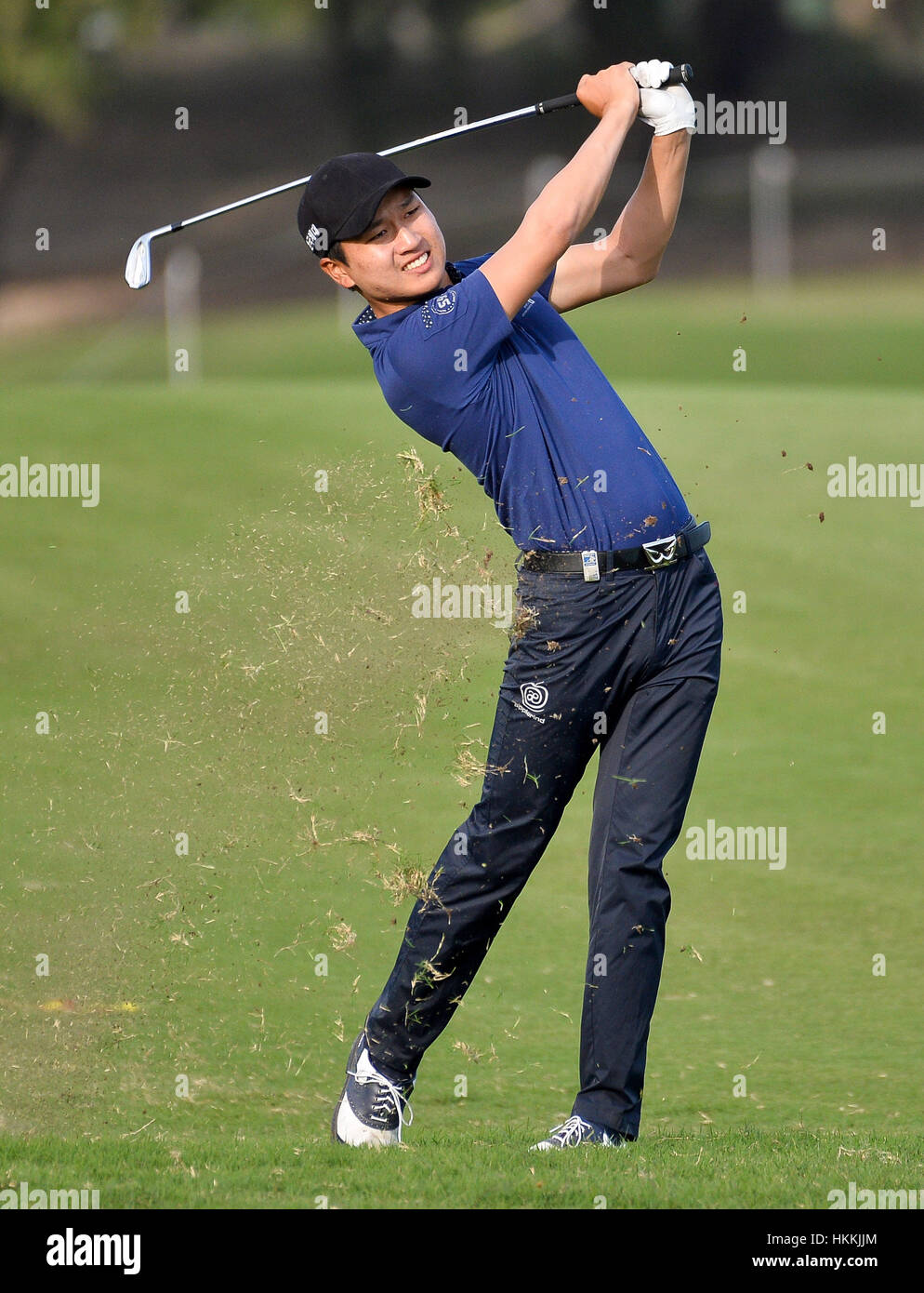 Doha, Qatar. 28 janvier, 2017. Jeunghun Wang de la Corée du Sud frappe la balle au cours de la troisième journée match au Qatar Masters au Club de golf de Doha à Doha, capitale du Qatar, le 28 janvier 2017. Credit : Nikku/Xinhua/Alamy Live News Banque D'Images