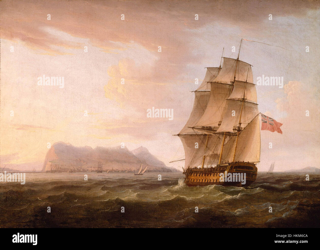 Cette peinture de Thomas Whitcombe représente un navire homme de guerre britannique ancré devant le Rocher de Gibraltar, mettant en valeur la puissance et la majesté de la guerre navale au XVIIIe siècle. Banque D'Images