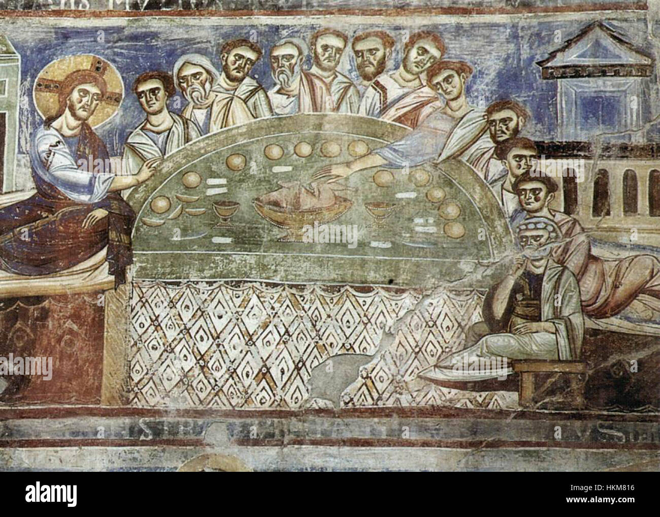 Une représentation historique de la Cène, peinte par un artiste inconnu au XIe siècle. La pièce reflète la signification religieuse et les styles artistiques médiévaux. Banque D'Images