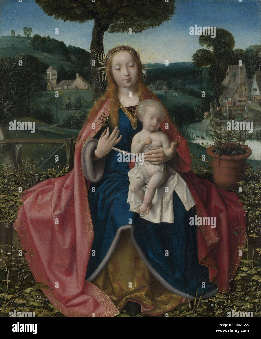 Cette peinture, attribuée à Jan Provoost, intitulée 'la Vierge à l'enfant dans un paysage', représente la Vierge Marie avec l'enfant Jésus sur un paysage serein. La pièce reflète les techniques du début de la Renaissance et le symbolisme religieux. Banque D'Images