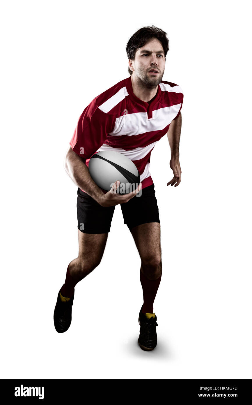 Joueur de Rugby dans un uniforme rouge d'exécution. Fond blanc Banque D'Images