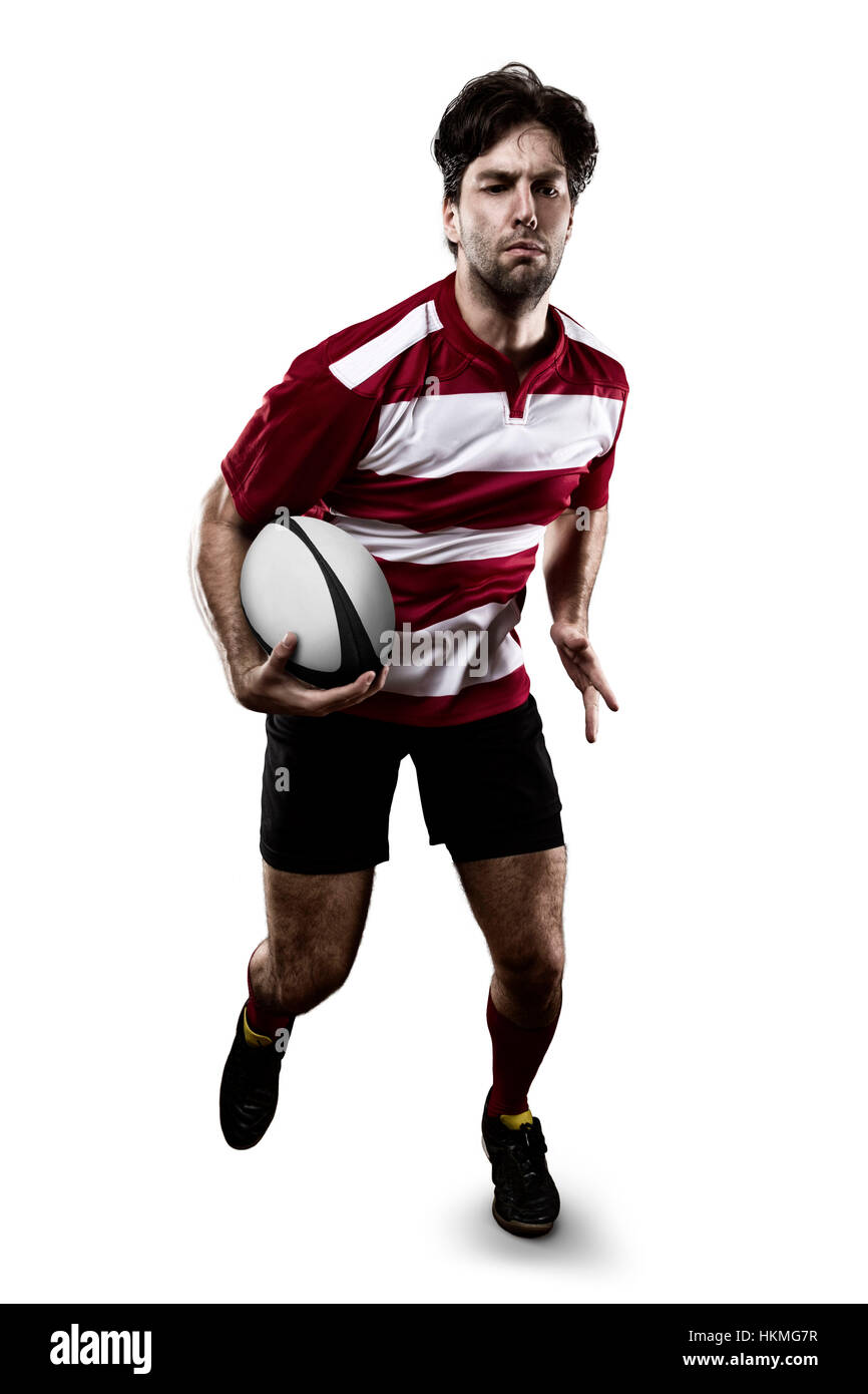 Joueur de Rugby dans un uniforme rouge d'exécution. Fond blanc Banque D'Images
